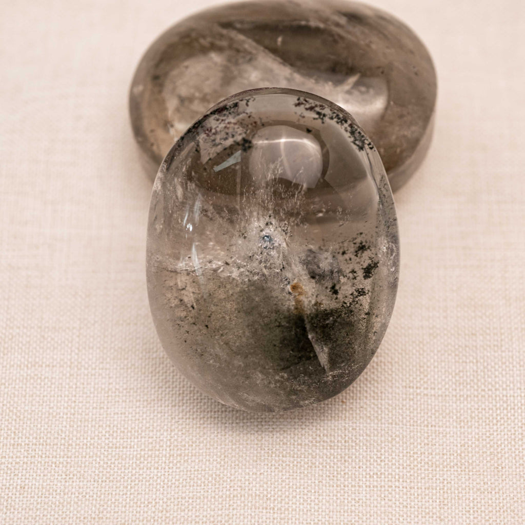 Harmonious Phantom Quartz Palmstone promoting emotional stability