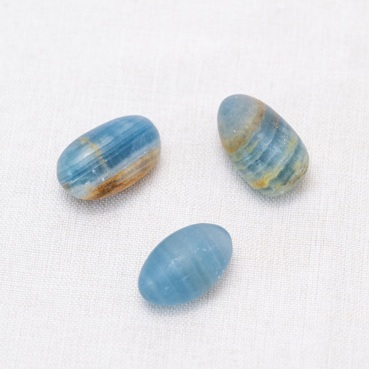 Displayed Blue Onyx tumbled stones for clear communication.