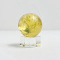  Place the citrine sphere in the wealth corner of your home or office to attract wealth and success. The wealth corner is typically the farthest diagonal from the entrance or room.