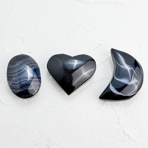 Black Lace Agate Heart/Moon Palmstone with intricate patterns