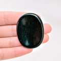 The Green Sand Worry Stone promotes emotional balance and positivity