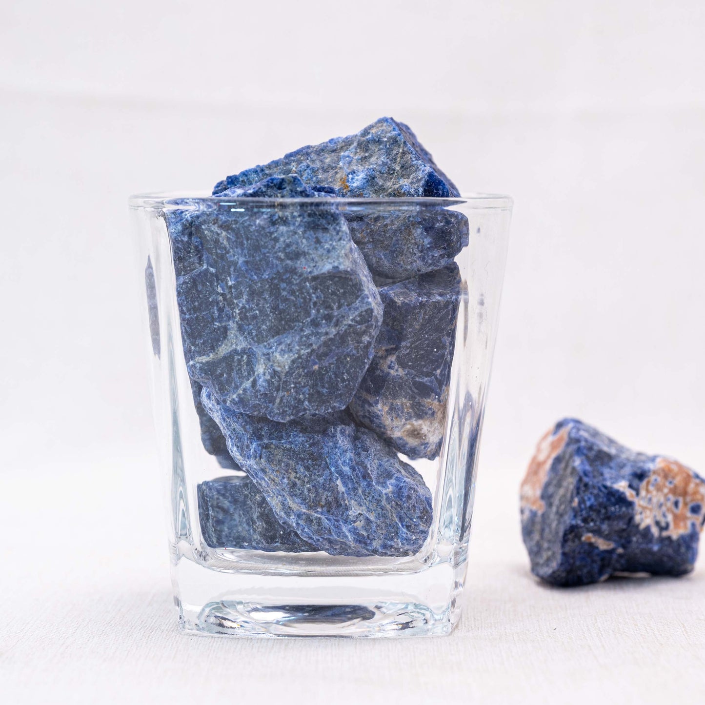 Unpolished larimar stones promote peace and relaxation