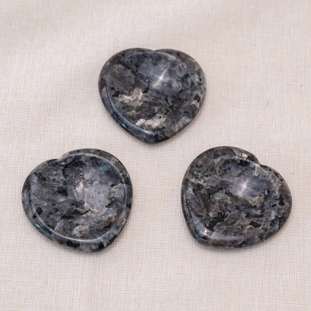 Carry the Larvikite Heart Worry Stone to dispel negative energies