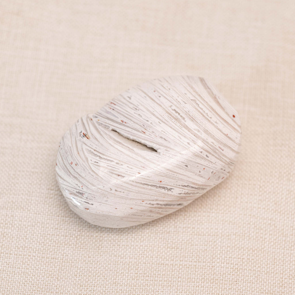 White Mexico Agate Palmstone: A beautiful handcrafted crystal radiating calming energy