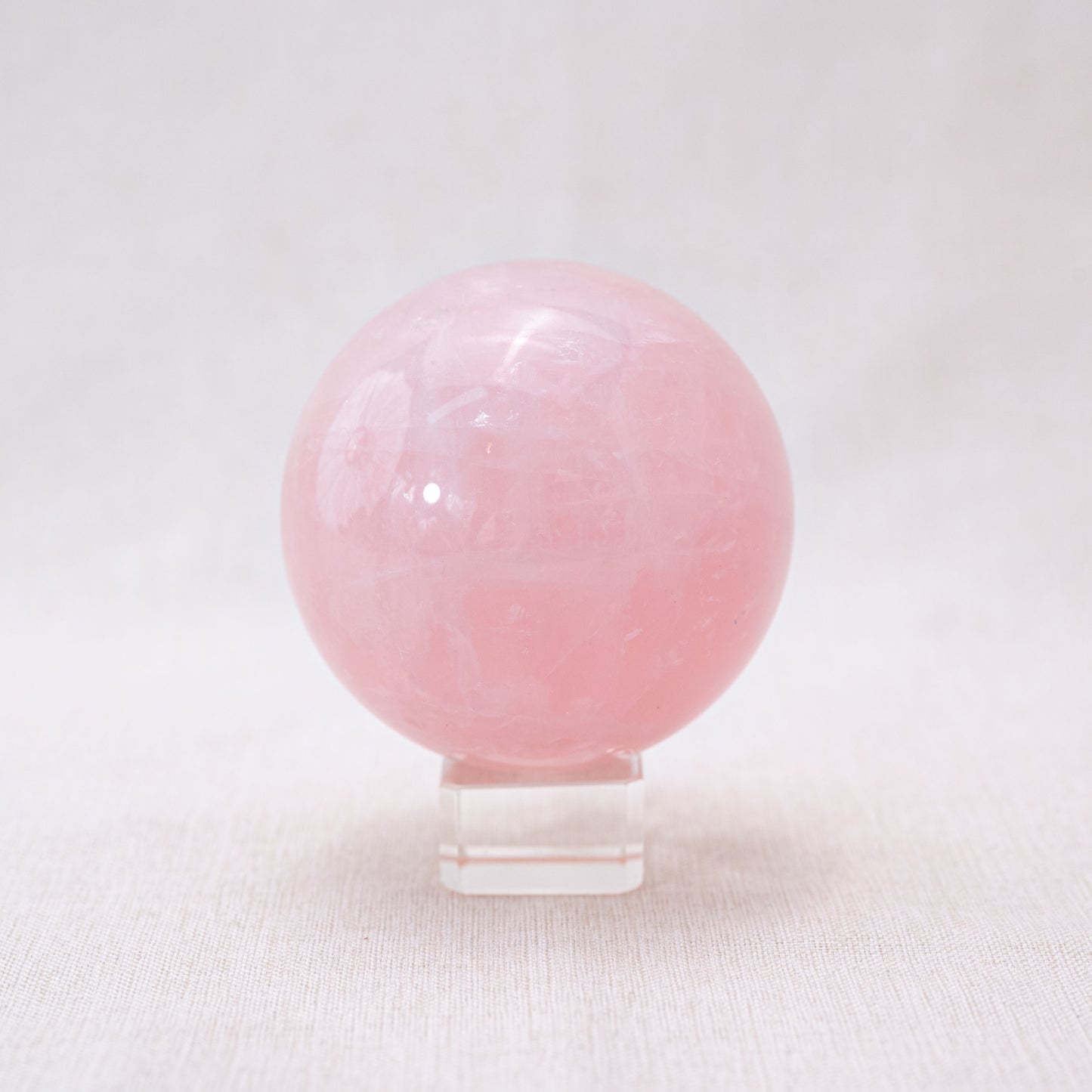 Rose Quartz Sphere for love and emotional healing with natural pink hues