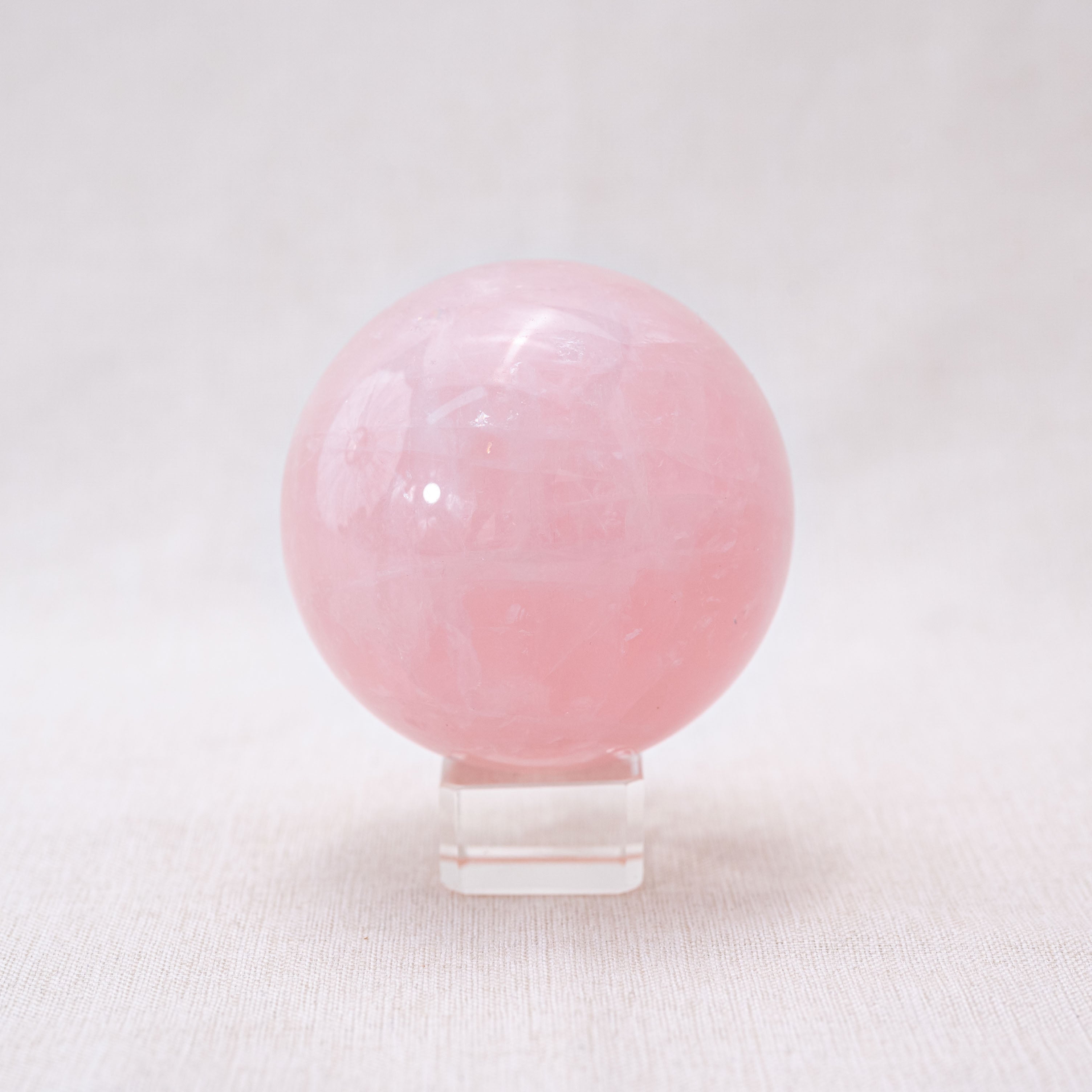 Rose Quartz Sphere for love and emotional healing with natural pink hues
