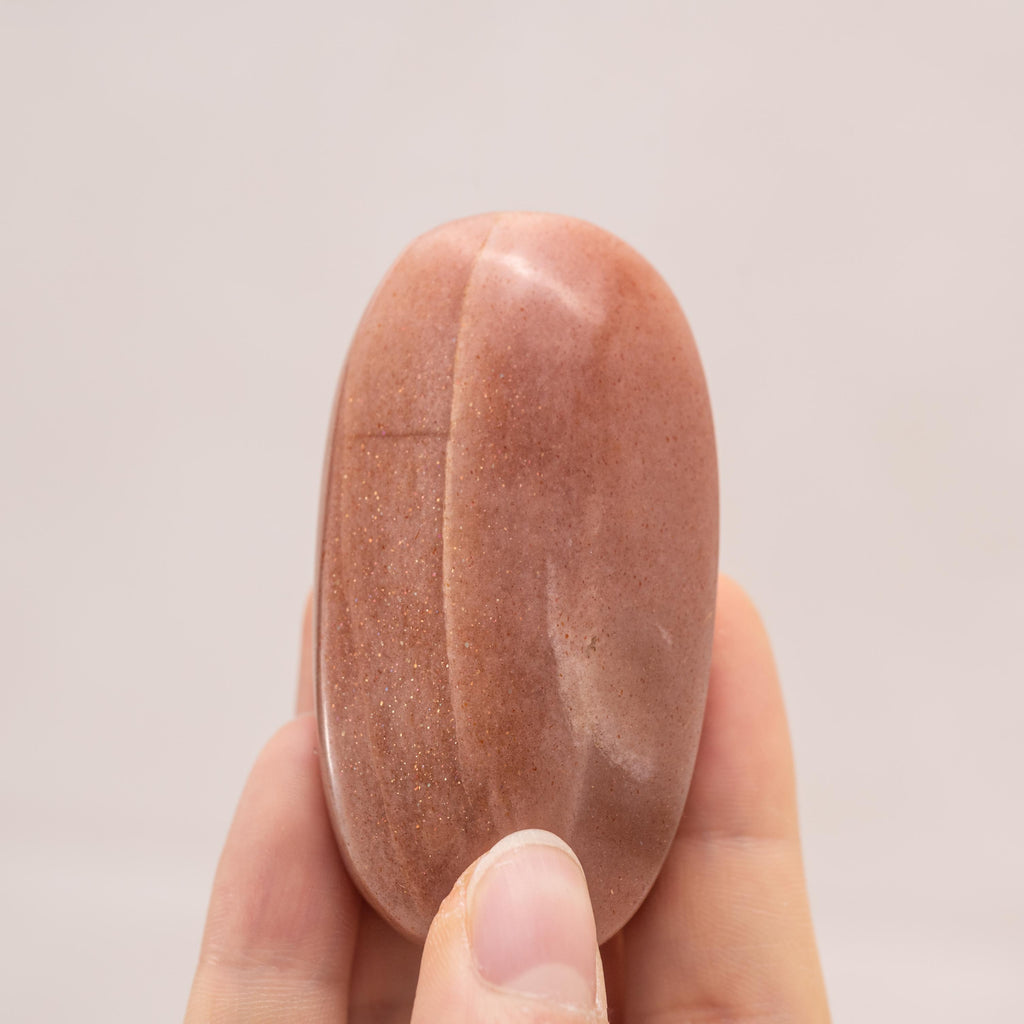 Hand-polished Golden Sun Stone Palm Stone, perfect for enhancing vitality