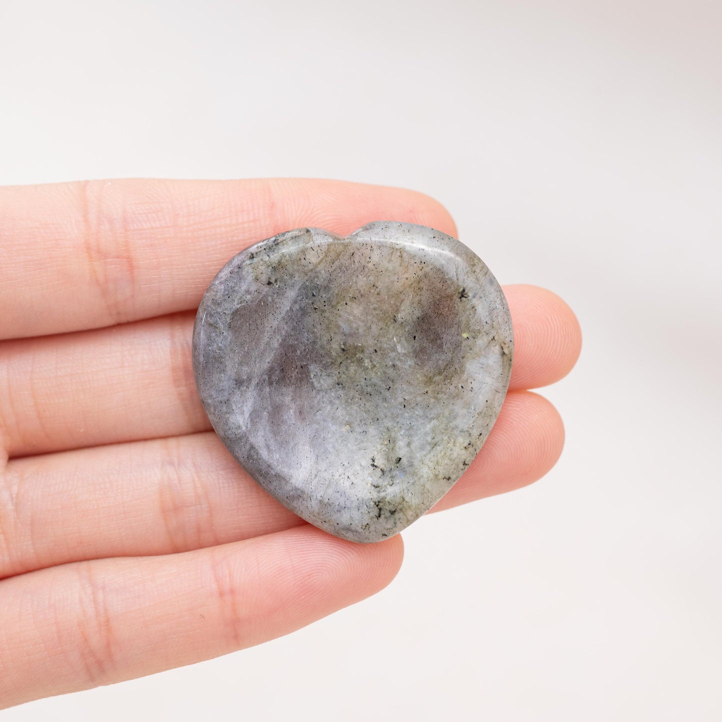 The Labradorite Heart Worry Stone is a symbol of strength and resilience