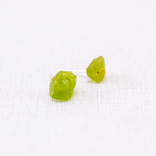 Peridot Earrings attract positivity and abundance, fostering love and compassion.