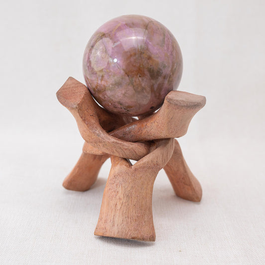 This handcrafted wooden tripod stand ensures your crystals are displayed securely and beautifully.