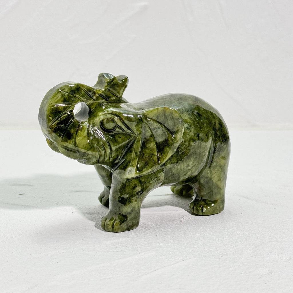 Lucky elephant sculpture in Xiuyu Jade