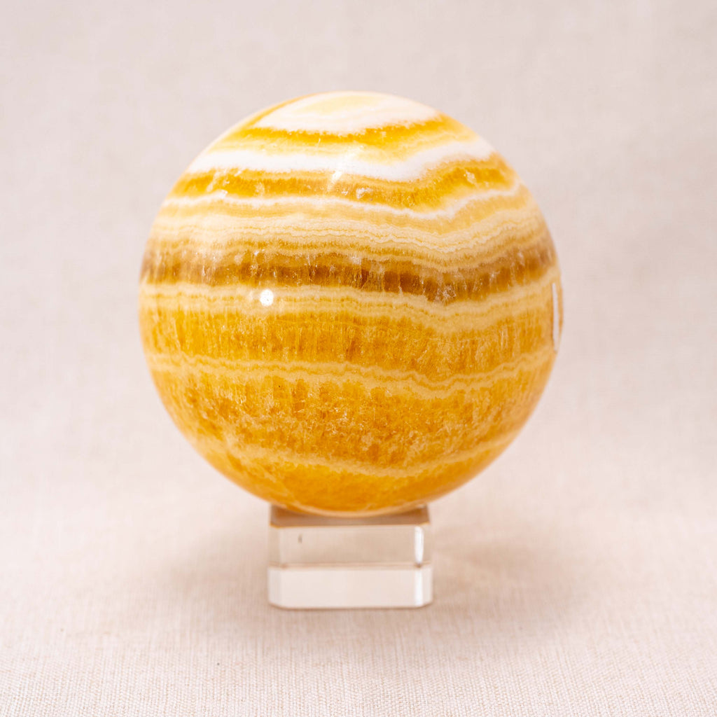 Yellow Calcite Sphere with vibrant yellow tones